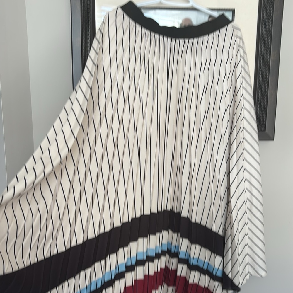 Long pleated skirt with in cream with black stripes and colour block at bottom L